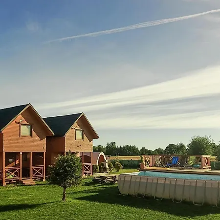 Holiday home Cozy In With Outdoor Swimming Pool Postomino